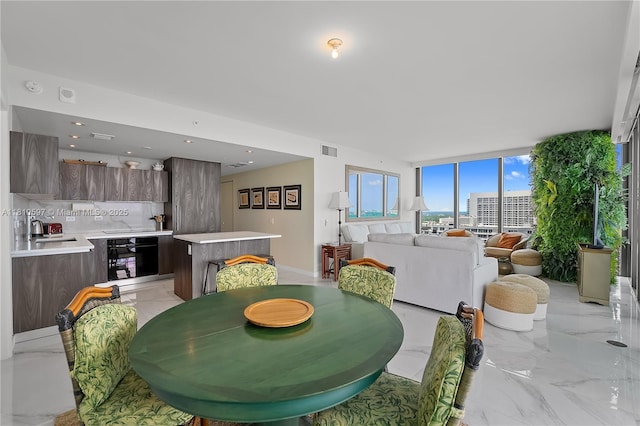 3131 NE 7th Ave Unit 3106, Miami, FL 33137 - dining space featuring light marble finish floors
