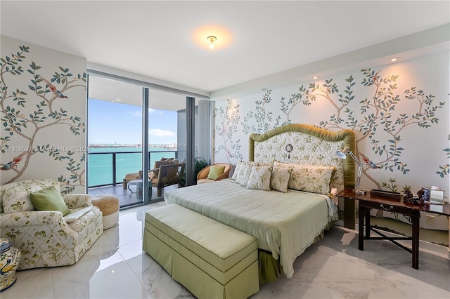 3131 NE 7th Ave Unit 3106, Miami, FL 33137 - bedroom with expansive windows, access to exterior, a water view, and light marble finish flooring