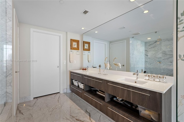 3131 NE 7th Ave Unit 3106, Miami, FL 33137 - full bathroom with marble tiled flooring, double vanity, a marble finish shower, and recessed lighting