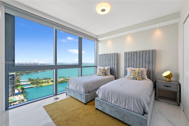 3131 NE 7th Ave Unit 3106, Miami, FL 33137 - bedroom featuring a water view, marble finish floors, and floor to ceiling windows