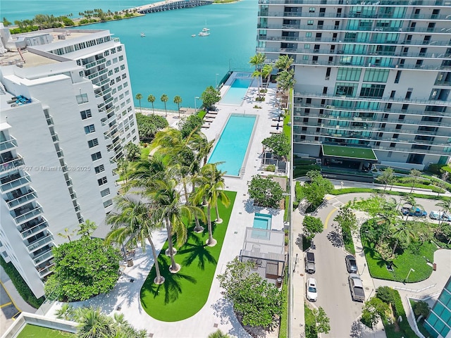 3131 NE 7th Ave Unit 3106, Miami, FL 33137 - bird's eye view of a pool, a nearby body of water, and apartment complex / building