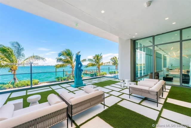 3131 NE 7th Ave Unit 3106, Miami, FL 33137 - balcony with outdoor lounge area and a water view