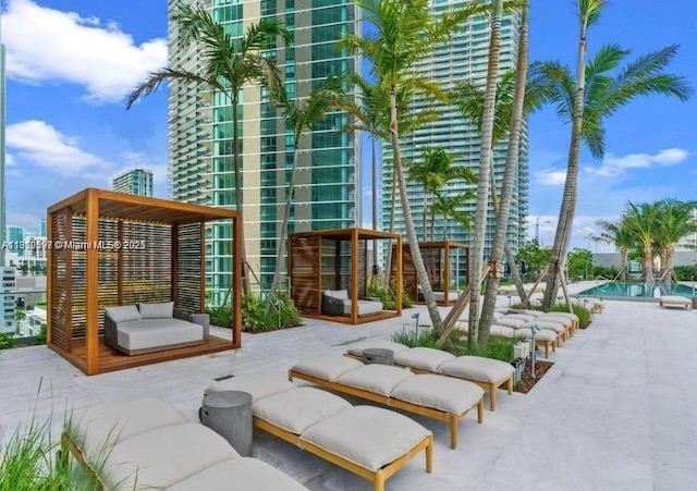3131 NE 7th Ave Unit 3106, Miami, FL 33137 - view of patio with an outdoor hangout area and a community pool
