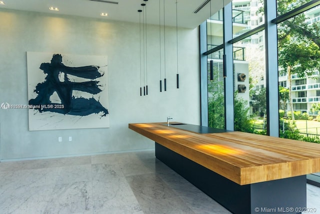 3131 NE 7th Ave Unit 3106, Miami, FL 33137 - playroom with marble finish floors and expansive windows