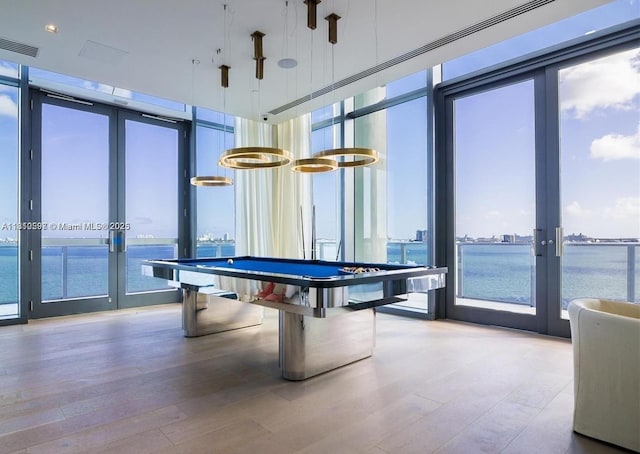 3131 NE 7th Ave Unit 3106, Miami, FL 33137 - playroom with french doors, wood finished floors, a water view, and billiards