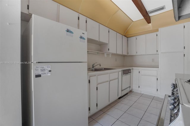 306 Cambridge Rd Unit 2-36, Hollywood, FL 33024 - kitchen featuring freestanding refrigerator, dishwashing machine, a sink, light countertops, and light tile patterned flooring