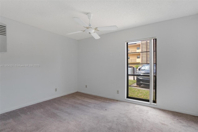 306 Cambridge Rd Unit 2-36, Hollywood, FL 33024 - spare room featuring carpet floors, baseboards, and a ceiling fan