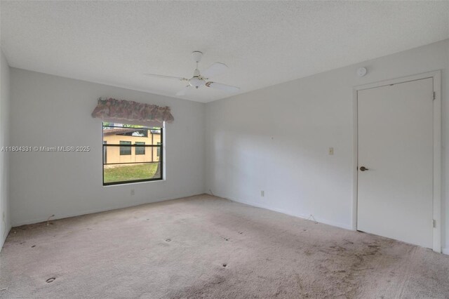 306 Cambridge Rd Unit 2-36, Hollywood, FL 33024 - unfurnished room with carpet floors and ceiling fan