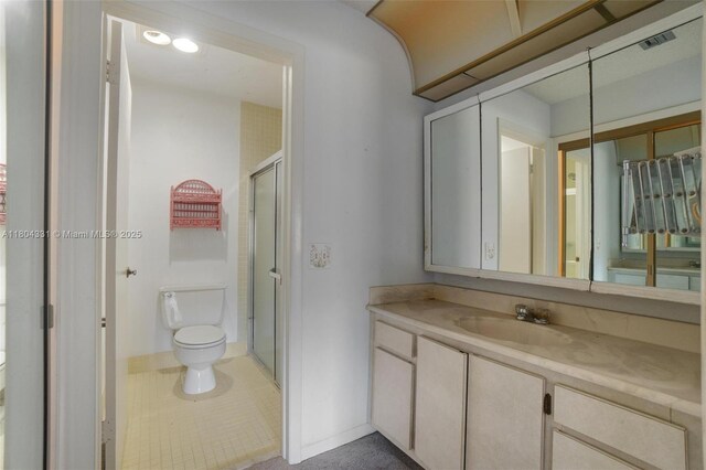 306 Cambridge Rd Unit 2-36, Hollywood, FL 33024 - full bath with toilet, vanity, a stall shower, and baseboards