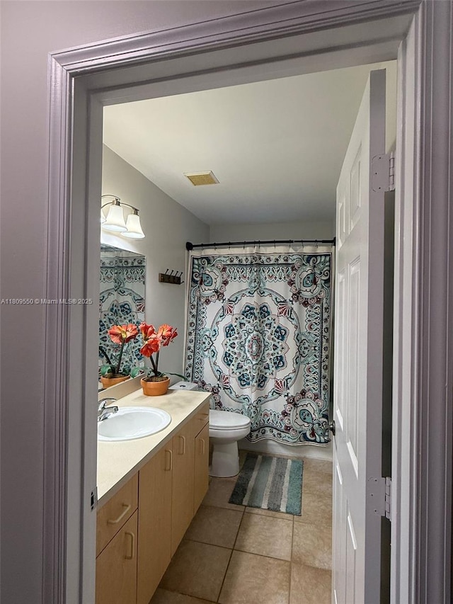 5552 NW 125th Ter, Coral Springs, FL 33076 - full bath with vanity, tile patterned flooring, toilet, and a shower with shower curtain