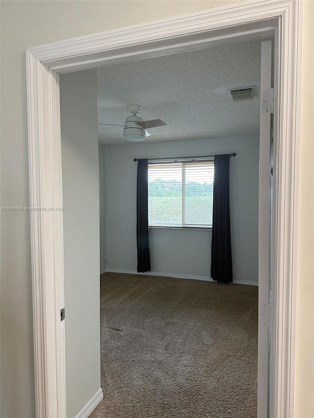 5552 NW 125th Ter, Coral Springs, FL 33076 - carpeted empty room with baseboards