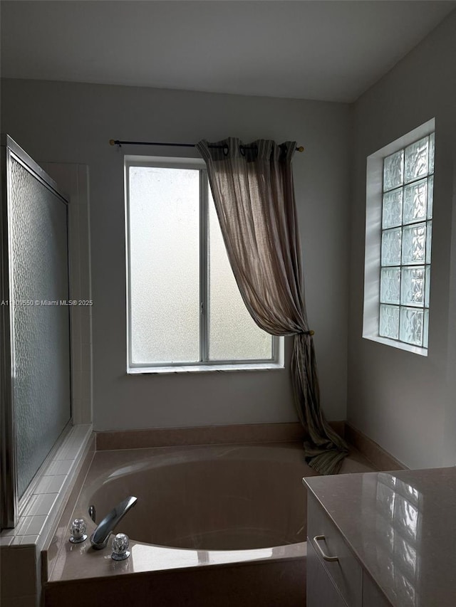 5552 NW 125th Ter, Coral Springs, FL 33076 - bathroom featuring a bath and vanity