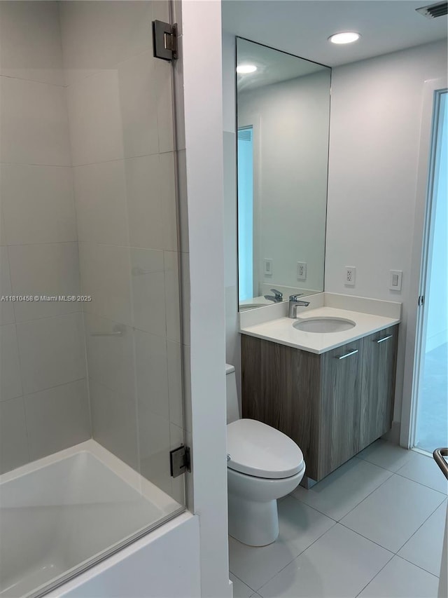 501 NE 31st St Unit 906, Miami, FL 33137 - full bath featuring vanity, toilet, tile patterned floors, shower / bath combination, and recessed lighting