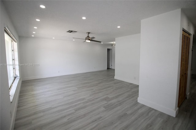 7204 NW 76th Dr, Tamarac, FL 33321 - unfurnished room featuring recessed lighting, ceiling fan, wood finished floors, and baseboards