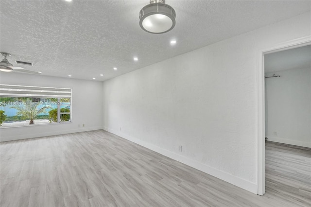 7204 NW 76th Dr, Tamarac, FL 33321 - spare room with light wood-type flooring, a textured ceiling, recessed lighting, and a ceiling fan