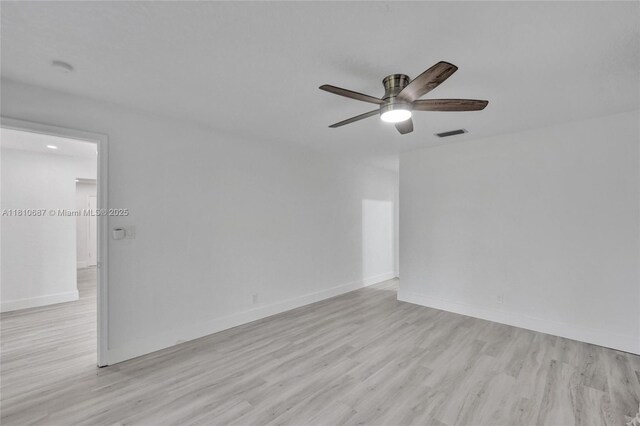 7204 NW 76th Dr, Tamarac, FL 33321 - empty room with a ceiling fan and wood finished floors