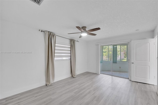 7204 NW 76th Dr, Tamarac, FL 33321 - unfurnished bedroom with light wood-style floors and a ceiling fan