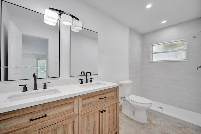7204 NW 76th Dr, Tamarac, FL 33321 - bathroom featuring double vanity, a tile shower, and recessed lighting