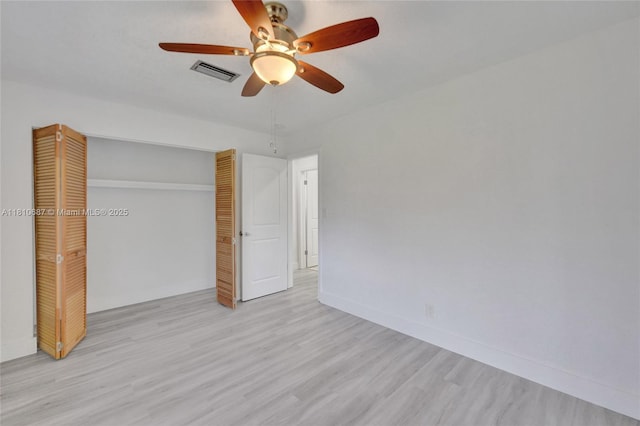 7204 NW 76th Dr, Tamarac, FL 33321 - unfurnished bedroom featuring a closet, wood finished floors, and ceiling fan