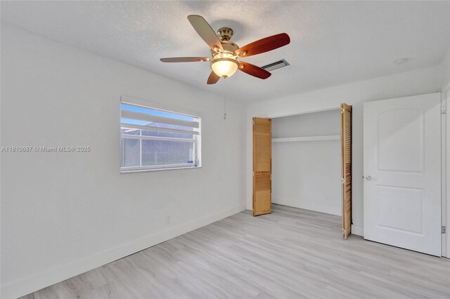 7204 NW 76th Dr, Tamarac, FL 33321 - unfurnished bedroom featuring light wood-style flooring, a closet, and ceiling fan
