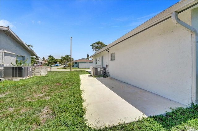 7204 NW 76th Dr, Tamarac, FL 33321 - view of green lawn with a patio area and a residential view