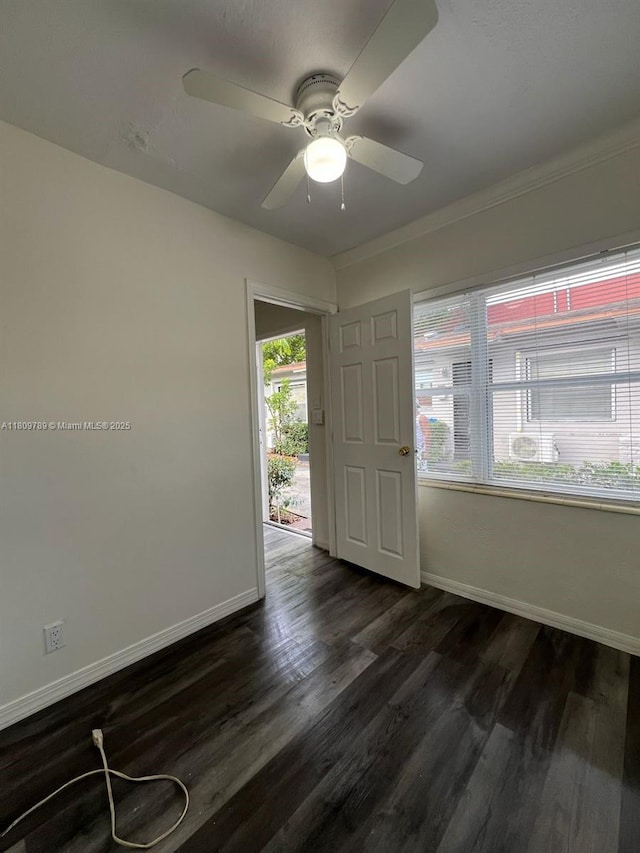 915 N 19th Ave, Hollywood, FL 33020 - spare room featuring baseboards, dark wood-style flooring, ceiling fan, and crown molding