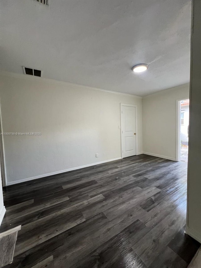 915 N 19th Ave, Hollywood, FL 33020 - spare room featuring dark wood-type flooring and baseboards