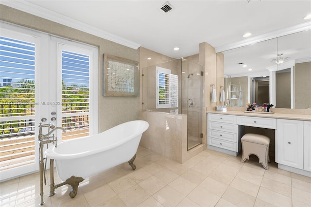 275 189th Ter, Sunny Isles Beach, FL 33160 - full bath featuring vanity, a freestanding tub, a stall shower, crown molding, and tile patterned floors