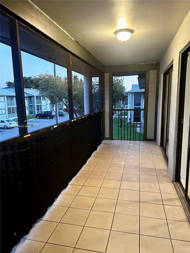 20760 NE 4th Ct Unit 201, Miami, FL 33179 - corridor with light tile patterned floors