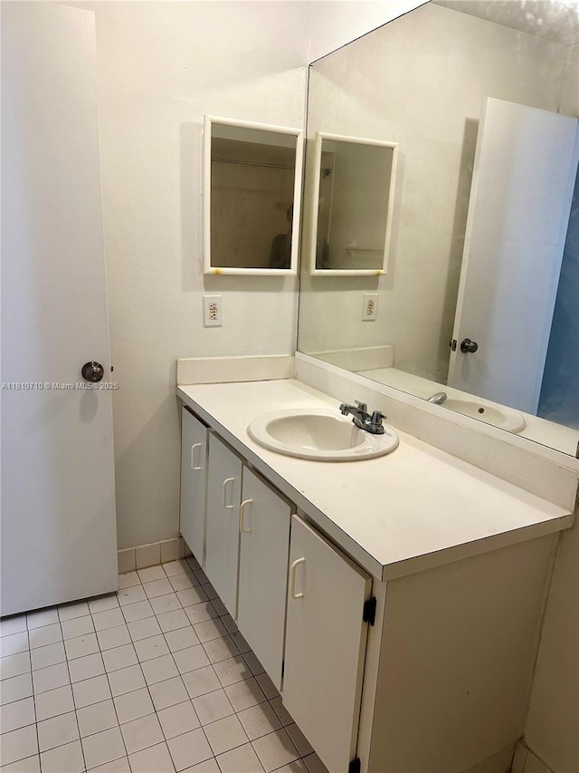 20760 NE 4th Ct Unit 201, Miami, FL 33179 - bathroom with vanity and tile patterned flooring