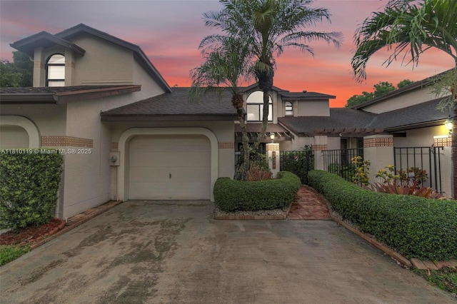 13731 SW 103rd Ter, Miami, FL 33186 - view of front of property with an attached garage, stucco siding, and concrete driveway