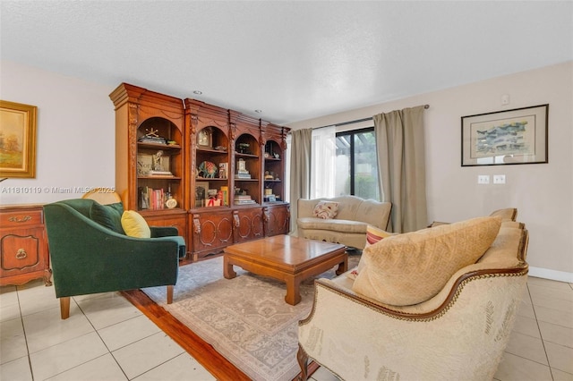 13731 SW 103rd Ter, Miami, FL 33186 - living area with light tile patterned floors and baseboards
