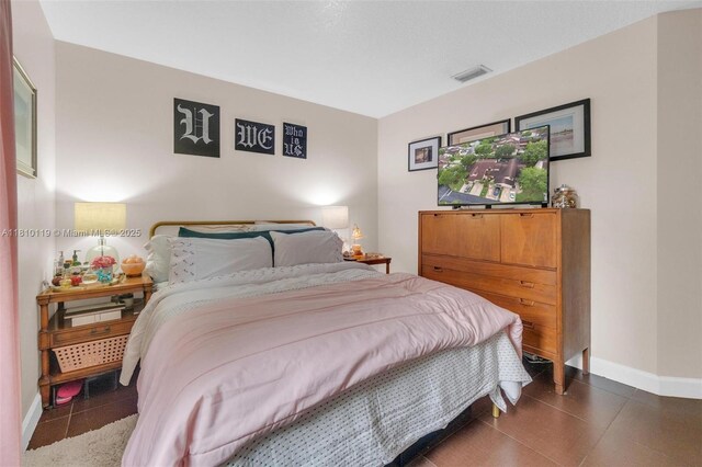 13731 SW 103rd Ter, Miami, FL 33186 - bedroom featuring baseboards