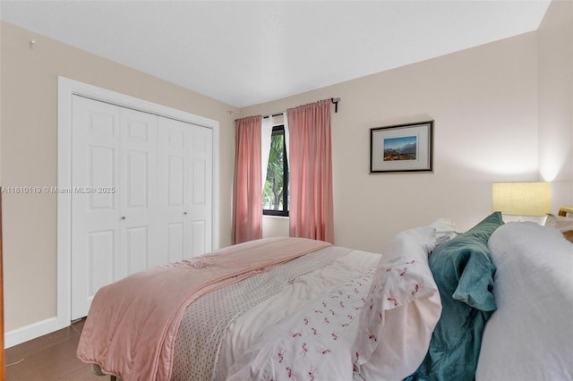 13731 SW 103rd Ter, Miami, FL 33186 - bedroom featuring a closet and baseboards