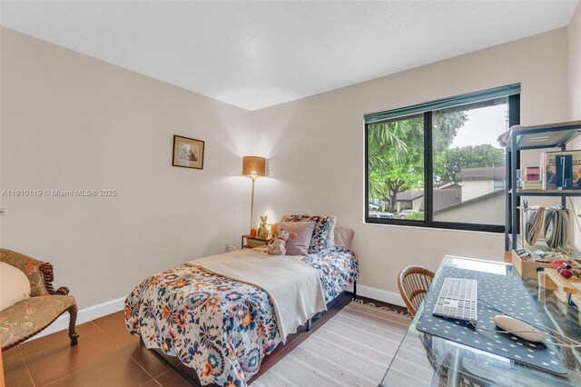 13731 SW 103rd Ter, Miami, FL 33186 - bedroom featuring baseboards