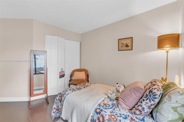 13731 SW 103rd Ter, Miami, FL 33186 - bedroom featuring tile patterned floors and a closet