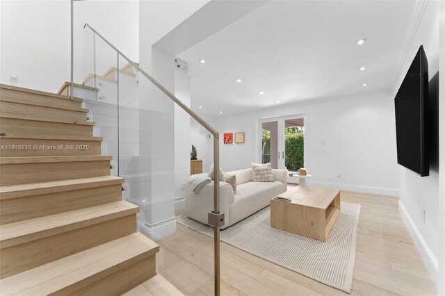 1210 95th St, Bay Harbor Islands, FL 33154 - living room with light wood-type flooring, stairs, recessed lighting, and baseboards