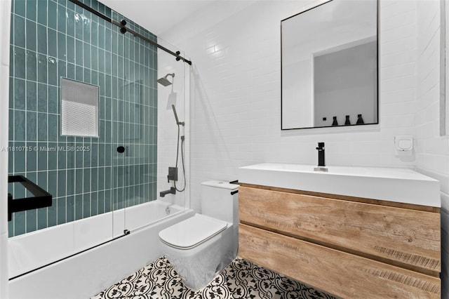 1210 95th St, Bay Harbor Islands, FL 33154 - bathroom with tile walls, toilet, bathtub / shower combination, vanity, and tile patterned flooring