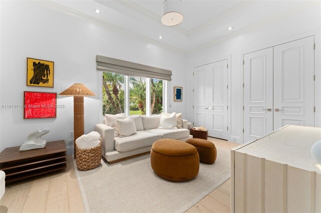 1210 95th St, Bay Harbor Islands, FL 33154 - living room featuring crown molding, light wood-style flooring, recessed lighting, and a high ceiling