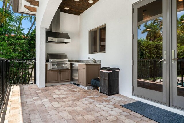 1210 95th St, Bay Harbor Islands, FL 33154 - view of patio featuring french doors and a sink