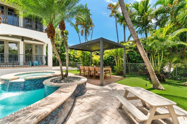 1210 95th St, Bay Harbor Islands, FL 33154 - view of pool featuring a patio area, outdoor dining area, ceiling fan, and a pool with connected hot tub