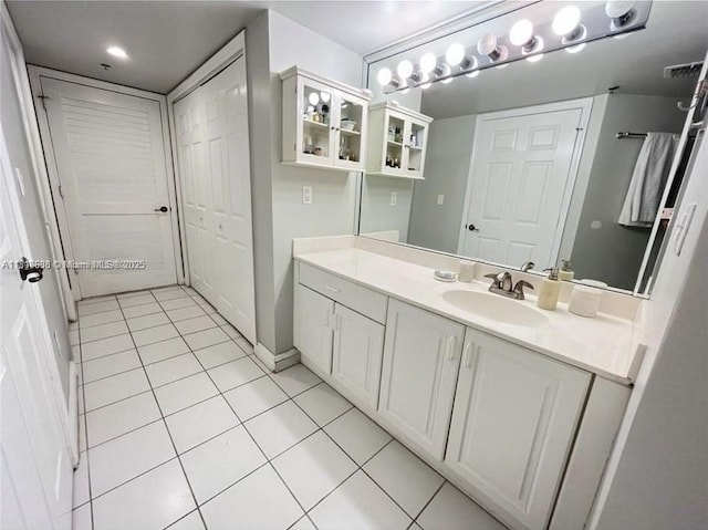 1650 Coral Way Unit 403, Miami, FL 33145 - bathroom featuring tile patterned floors and vanity