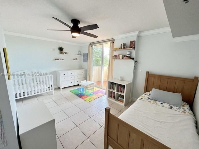 1650 Coral Way Unit 403, Miami, FL 33145 - bedroom with light tile patterned floors, crown molding, ceiling fan, baseboards, and access to exterior