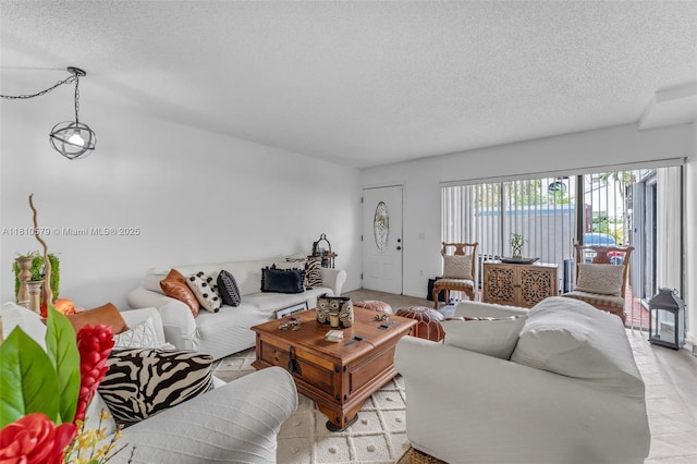 8341 SW 157th Ave Unit 304, Miami, FL 33193 - living area featuring a textured ceiling