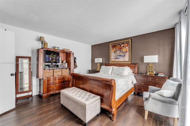 8341 SW 157th Ave Unit 304, Miami, FL 33193 - bedroom featuring dark wood finished floors and a textured ceiling