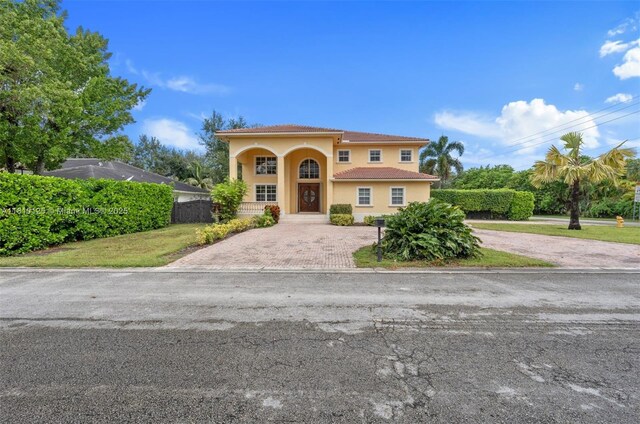 10733 SW 97th Ter, Miami, FL 33176 - mediterranean / spanish house with stucco siding and driveway