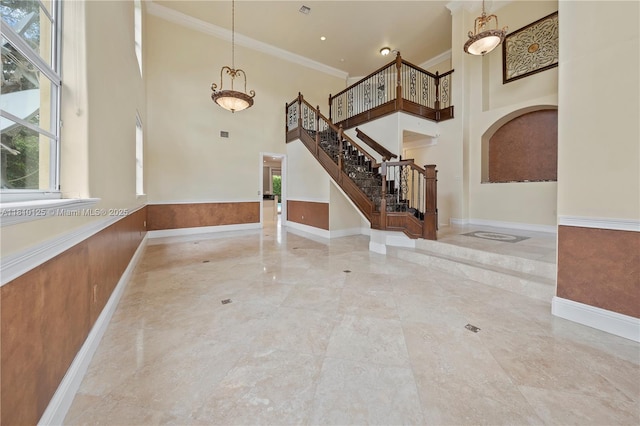 10733 SW 97th Ter, Miami, FL 33176 - entrance foyer featuring a high ceiling, plenty of natural light, stairway, ornamental molding, and baseboards