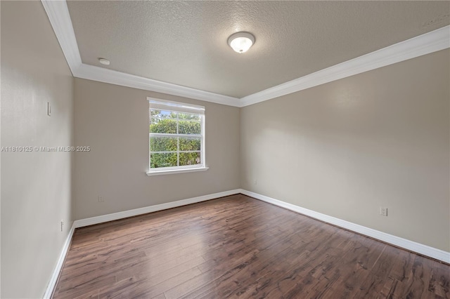 10733 SW 97th Ter, Miami, FL 33176 - unfurnished room featuring crown molding, a textured ceiling, dark wood finished floors, and baseboards