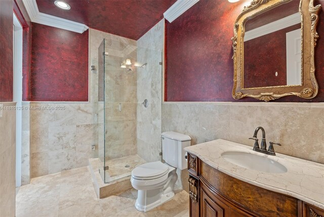 10733 SW 97th Ter, Miami, FL 33176 - bathroom featuring crown molding, a stall shower, tile walls, toilet, and vanity