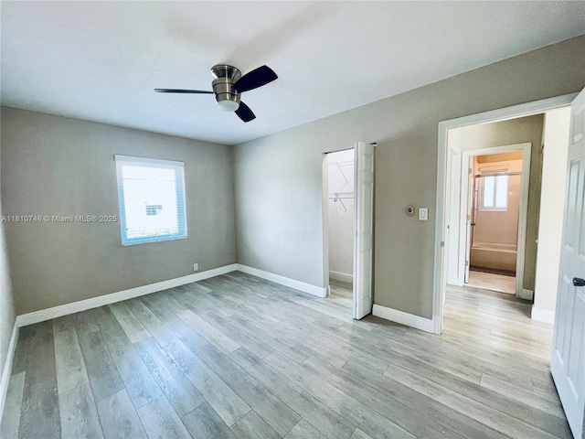 1002 S 27th Ave, Hollywood, FL 33020 - unfurnished bedroom with light wood-type flooring, baseboards, a closet, and a ceiling fan